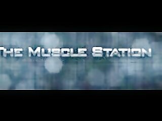 Scott flexing his huge biceps