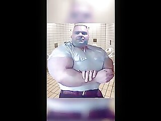 Massive Biceps in ultra-tight Shirt