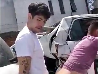 2 hot young latinos fuck outdoor between old cars.
