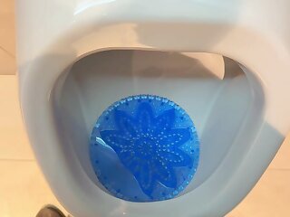 Hot uncut cock pissing in public urinal