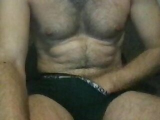 Fit guy with boxers on cam
