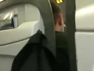 Dude jerks off and cums on the airplane