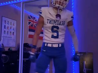 Watch this football player in full gear.