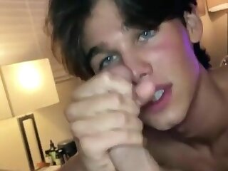 Blue-eyed teen enjoys dick in mouth